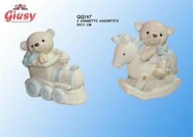 Salvadanaio Orsetto Su Treno e Cavallo A Dondolo Celeste 2 Soggetti Assortiti 9x11 Cm Completo Di Scatola