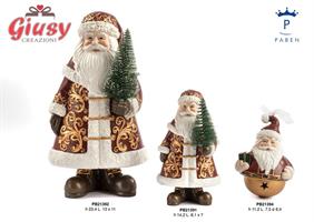 Babbo Natale Con Albero Di Natale In Resina H.23,4 Cm 1*24