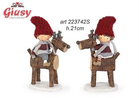 Bimbo E Bimba Su Renna Effetto Legno In Resina 2 Soggetti Assortiti H.21 Cm 4*16